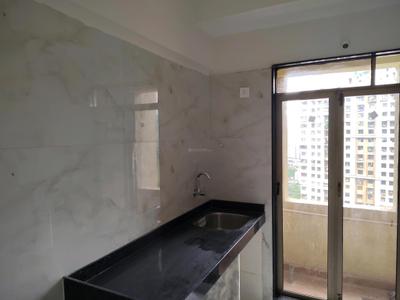Kitchen Image of 700 Sq.ft 1 BHK Apartment / Flat for rent in Parijat Gardens, Kasarvadavali Thane for Rs. 15500