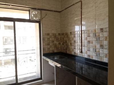 Kitchen Image of 700 Sq.ft 1 BHK Apartment / Flat for rent in Swaraj Kingston, Ulwe Navi Mumbai for Rs. 28000