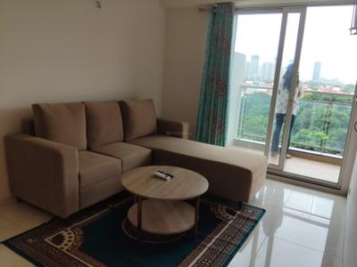 Living Room Image of 850 Sq.ft 1.5 BHK Studio for rent in Godrej Golf Links Villas, Jaypee Greens Greater Noida for Rs. 40000