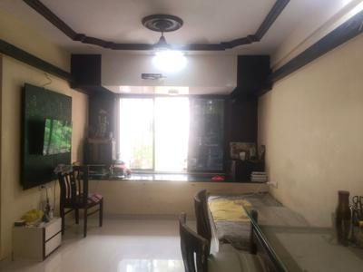 Living Room Image of 656 Sq.ft 2 BHK Apartment / Flat for sale in Ekta Ekta Bhoomi CHS, Kandivali West Mumbai for Rs. 21000000