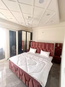 Bedroom Image of 1200 Sq.ft 2 BHK Builder Floor for rent in Sahastradhara Road Dehradun for Rs. 40000