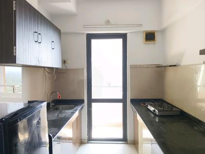 Kitchen Image of 650 Sq.ft 1 BHK Apartment / Flat for rent in Lodha Lakeshore Greens, Palava Phase 2 Thane for Rs. 17000