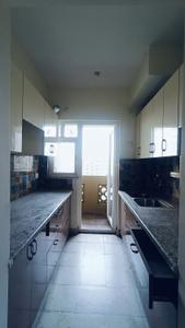 Kitchen Image of 945 Sq.ft 2.5 BHK Apartment / Flat for rent in Phase 2 Noida for Rs. 24000