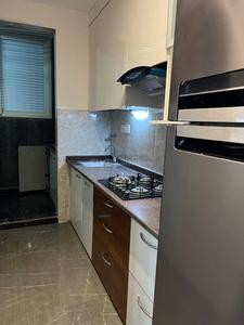 Kitchen Image of 1 room in a 3BHK flat - Shared Washroom in Tilak Nagar, New Delhi