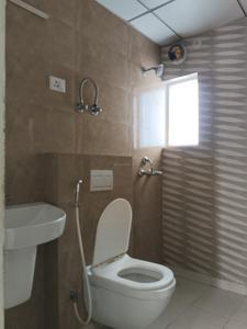 Common Bathroom Image of 900 Sq.ft 3 BHK Apartment / Flat for sale in Arihant Abode, Noida Extension Greater Noida for Rs. 12600000