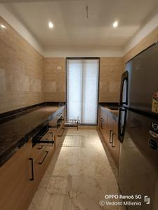 Kitchen Image of 910 Sq.ft 3 BHK Apartment / Flat for sale in Tharwani Vedant Millenia, Titwala Thane for Rs. 6100000