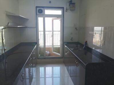 Kitchen Image of 900 Sq.ft 2 BHK Apartment / Flat for rent in Rustomjee Azziano, Thane West Thane for Rs. 40500