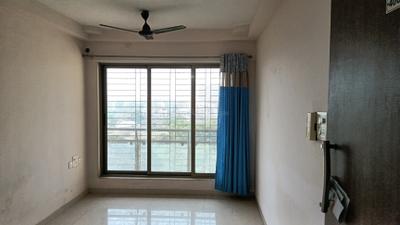 Living Room Image of 660 Sq.ft 1 BHK Apartment / Flat for sale in Vishesh Balaji Symphony, Shilottar Raichur Navi Mumbai for Rs. 4800000