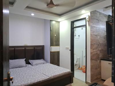 Bedroom Image of 250 Sq.ft 1 RK Builder Floor for rent in Ramesh Nagar New Delhi for Rs. 14000