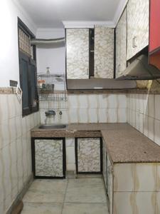 Kitchen Image of 650 Sq.ft 2 BHK Builder Floor for sale in Mahavir Enclave New Delhi for Rs. 3800000