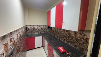 Kitchen Image of 475 Sq.ft 1 BHK Apartment / Flat for rent in Rajpur Khurd Extension New Delhi for Rs. 17000