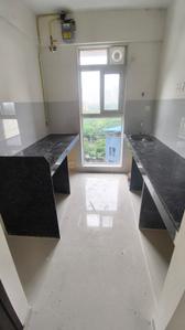 Kitchen Image of 700 Sq.ft 1 BHK Apartment / Flat for rent in Ashar Arize, Kalwa Thane for Rs. 27000