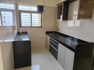 Kitchen Image of 1054 Sq.ft 2 BHK Apartment / Flat for sale in Vishesh Balaji Symphony, Shilottar Raichur Navi Mumbai for Rs. 8600000