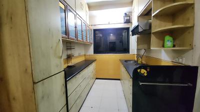 Kitchen Image of 725 Sq.ft 2 BHK Apartment / Flat for sale in Implosion CHS, Chedda Nagar Mumbai for Rs. 19000000