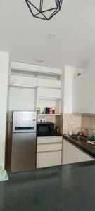 Kitchen Image of 710 Sq.ft 1 BHK Apartment / Flat for sale in Lodha Belmondo, Gahunje Pune for Rs. 7800000