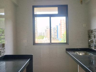 Kitchen Image of 715 Sq.ft 1 BHK Apartment / Flat for sale in Gopal Krishna Krishna Nisarga, Kalyan East Kalyan for Rs. 4250000