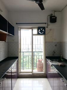 Kitchen Image of 670 Sq.ft 1 BHK Apartment / Flat for rent in Unique Greens, Thane West Thane for Rs. 25000