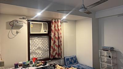Bedroom Image of 300 Sq.ft 1 RK Builder Floor for rent in Gautam Nagar New Delhi for Rs. 25000