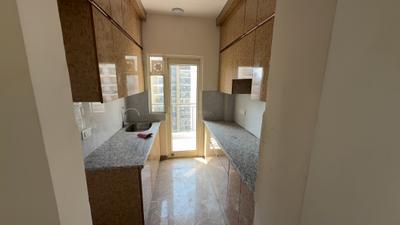Kitchen Image of 1300 Sq.ft 2.5 BHK Apartment / Flat for sale in Panchsheel Wellington, Crossings Republik Ghaziabad for Rs. 12000000