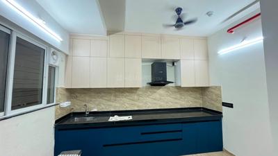Kitchen Image of 1050 Sq.ft 2 BHK Apartment / Flat for sale in VTP Beaumonde Building T2, Manjari Khurd Pune for Rs. 8500000