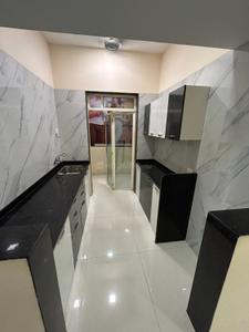 Kitchen Image of 900 Sq.ft 2 BHK Apartment / Flat for sale in Mohan Precious Greens, Ambernath East Ambernath for Rs. 4500000