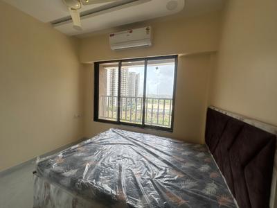 Bedroom Image of 950 Sq.ft 3 BHK Apartment / Flat for rent in Kini Pinnacle, Naigaon East Naigaon for Rs. 20000