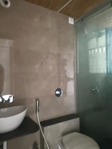 Common Bathroom Image of 1034 Sq.ft 2 BHK Apartment / Flat for rent in Orange Royal Orange County, Rahatani Pune for Rs. 29500