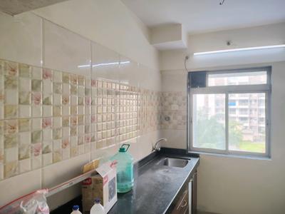 Kitchen Image of 700 Sq.ft 1 BHK Apartment / Flat for rent in Unique Greens, Kasarvadavali Thane for Rs. 17000