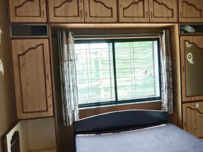 Bedroom Image of 902 Sq.ft 2 BHK Apartment / Flat for sale in Sai Darshan Apartment, Uday Nagar Nashik for Rs. 8000000