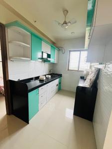 Kitchen Image of 950 Sq.ft 2 BHK Apartment / Flat for sale in Vishesh Balaji Symphony, Shilottar Raichur Navi Mumbai for Rs. 8500000