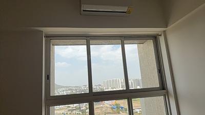 Living Room Image of 650 Sq.ft 1 BHK Studio for sale in Lodha Belmondo, Gahunje Pune for Rs. 6900000