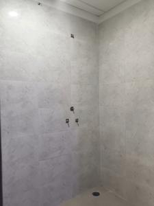 Common Bathroom Image of 1010 Sq.ft 2 BHK Apartment / Flat for sale in Trinity Krishna Kunj, Noida Extension Greater Noida for Rs. 4565000
