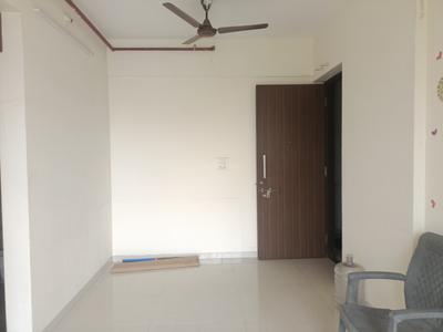 Living Room Image of 733 Sq.ft 1 BHK Apartment / Flat for sale in Vastusankalp Punyodaya Rio Type A, Kalyan West Kalyan for Rs. 5200000