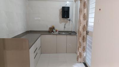Kitchen Image of 860 Sq.ft 2 BHK Apartment / Flat for rent in Wadhwani Om Manglam Chaitanya, Kiwale Pune for Rs. 21000