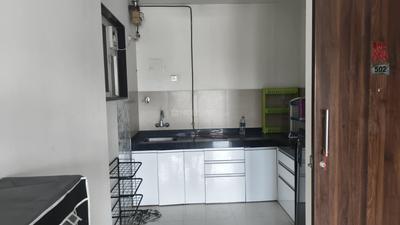 Kitchen Image of 700 Sq.ft 1 BHK Apartment / Flat for rent in Ajax Global Lifestyle Kharadi, Kharadi Pune for Rs. 30000