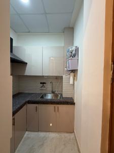 Kitchen Image of 400 Sq.ft 1 RK Studio for rent in HUDA Plot Sector 42, Sector 42 Gurgaon for Rs. 26500