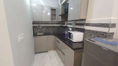 Kitchen Image of 900 Sq.ft 1 BHK Builder Floor for rent in Sector 38 Gurgaon for Rs. 30000