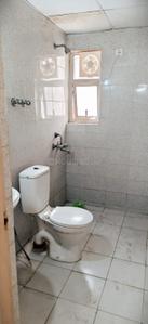 Bathroom Image of 966 Sq.ft 2 BHK Apartment / Flat for rent in Phase 2 Noida for Rs. 20000