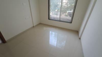 Bedroom Image of 660 Sq.ft 1 BHK Apartment / Flat for rent in Ajmera Exotica, Wagholi Pune for Rs. 15000