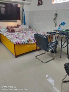 Bedroom Image of Swami Vivekanand PG in Vasundhara Enclave, New Delhi