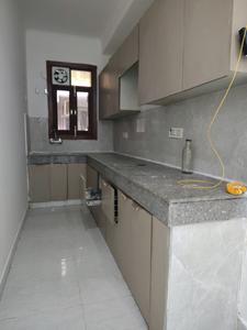 Kitchen Image of 800 Sq.ft 2 BHK Apartment / Flat for rent in Rajpur Khurd Village New Delhi for Rs. 25000