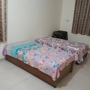 Bedroom Image of Apna Ghar PG in Paschim Vihar, New Delhi
