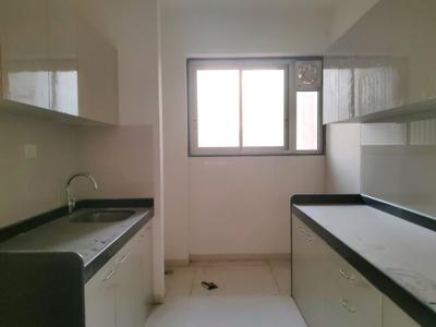 Kitchen Image of 695 Sq.ft 2 BHK Apartment / Flat for rent in Runwal Sanctuary, Mulund West Mumbai for Rs. 58000