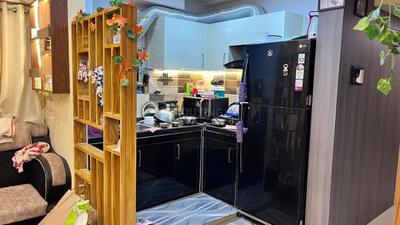 Kitchen Image of 897 Sq.ft 2 BHK Apartment / Flat for sale in Magnolia Oxygen, Rajarhat Kolkata for Rs. 5600000
