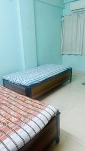 Bedroom Image of Gwalani PG in Gandhi Nagar, Nagpur
