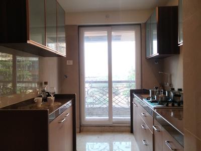 Kitchen Image of 1200 Sq.ft 2 BHK Apartment / Flat for sale in Tharwanis Sky View, Kharghar Navi Mumbai for Rs. 12600000