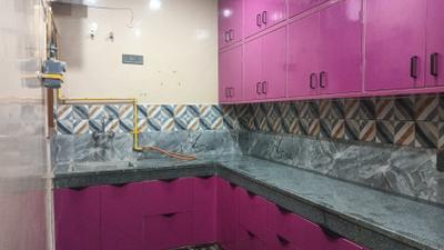Kitchen Image of 909 Sq.ft 3 BHK Builder Floor for rent in Aya Nagar New Delhi for Rs. 16000