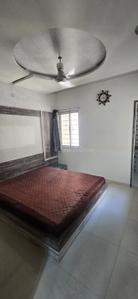Bedroom Image of 700 Sq.ft 2 BHK Apartment / Flat for rent in Vasantbhai Vasant Malhar, Yogi Nagar Rajkot for Rs. 21000