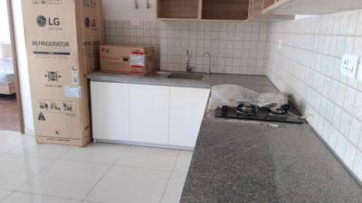 Kitchen Image of 975 Sq.ft 1.5 BHK Apartment / Flat for sale in Godrej The Suites, Jaypee Greens Greater Noida for Rs. 12500000