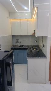 Kitchen Image of 550 Sq.ft 1 BHK Apartment / Flat for rent in Dwarka Mor New Delhi for Rs. 18000